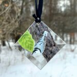 "Hand-painted Nuthatch suncatcher, vibrant glass art hanging in a window. Perfect for bird lovers and nature-inspired home decor."